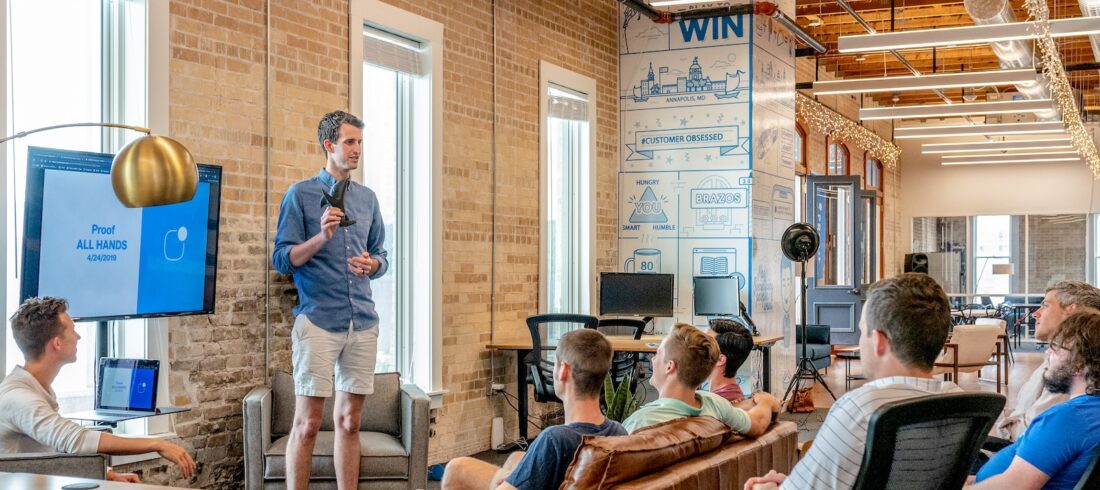 Man standing in front of employees
